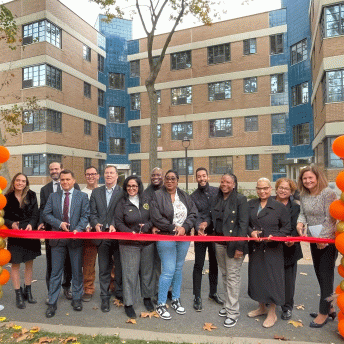 city and partners cutting the ribbon at Williamsburg Houses 